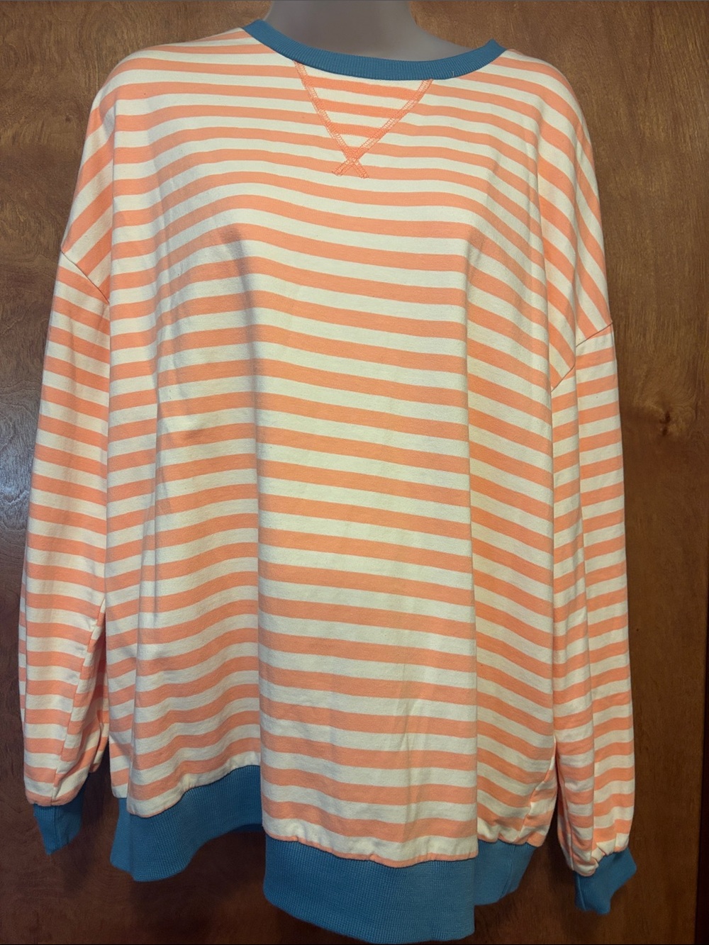 Striped Crewneck Sweatshirt in Peach and Cream with Blue Trim